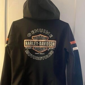 Size SM women’s Harley thick cloth jacket. Barely worn.